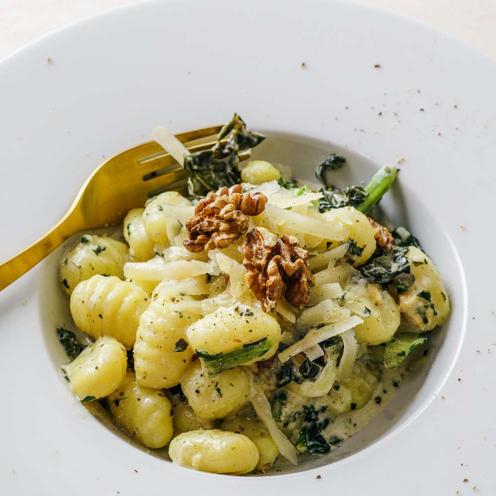 Creamy Gnocchi with Walnuts & Greens