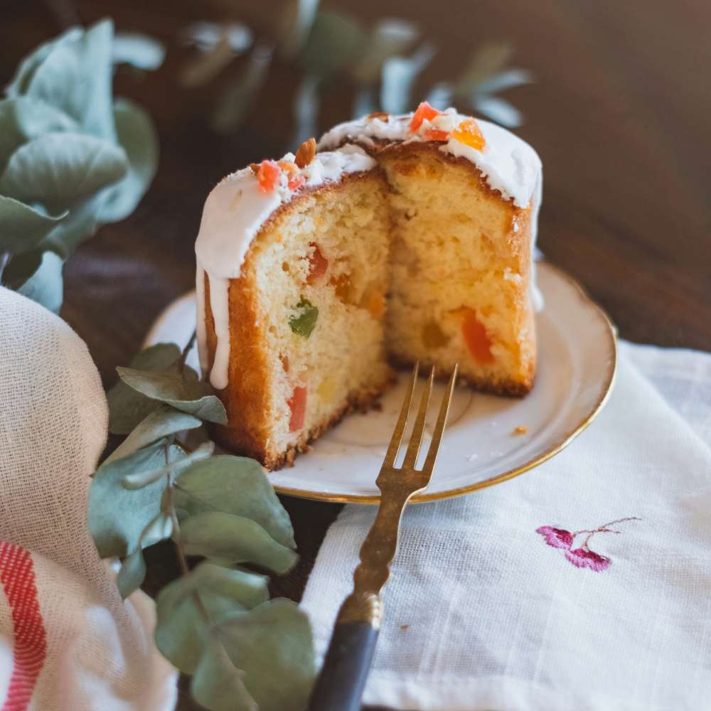 Classic Italian Panettone Slice with Candied Fruit and Icing